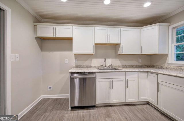 3647 Miller St, Lithia Springs, GA 30122 - kitchen with dishwasher, a sink, light wood-type flooring, white cabinets, and crown molding