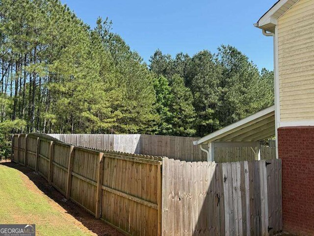 view of yard with fence