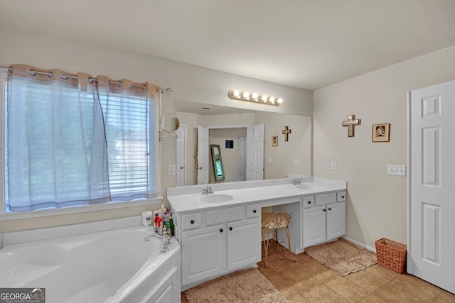 full bath with double vanity, a garden tub, and a sink