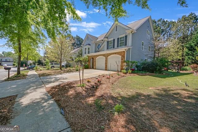 exterior space featuring a garage, driveway, and a lawn