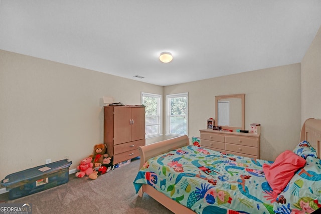bedroom featuring visible vents and carpet floors