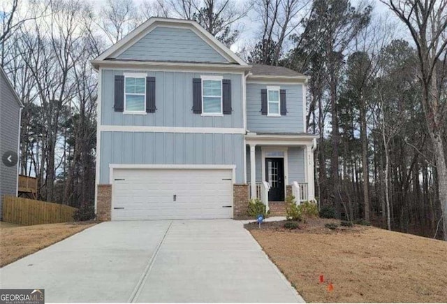 6615 Bluffview Dr, Douglasville, GA 30134 - craftsman-style home featuring board and batten siding, an attached garage, and driveway