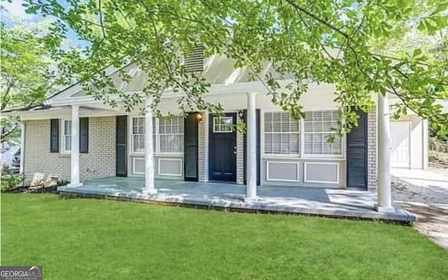 3539 Meadowridge Dr SW, Atlanta, GA 30331 - back of house featuring a yard and brick siding