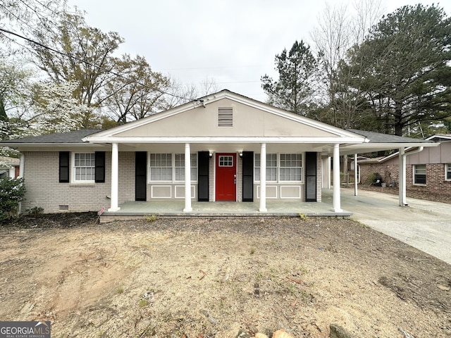 3539 Meadowridge Dr SW, Atlanta, GA 30331 - view of front of property featuring crawl space, covered porch, a carport, brick siding, and driveway
