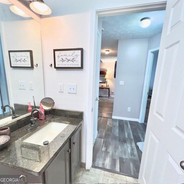 33 Mountain View Dr, Rockmart, GA 30153 - bathroom featuring vanity and wood finished floors