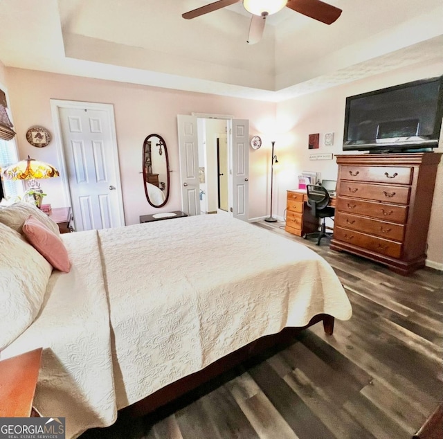 33 Mountain View Dr, Rockmart, GA 30153 - bedroom featuring a raised ceiling, dark wood-type flooring, and a ceiling fan
