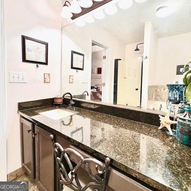 33 Mountain View Dr, Rockmart, GA 30153 - bathroom with vanity, a stall shower, and a bath