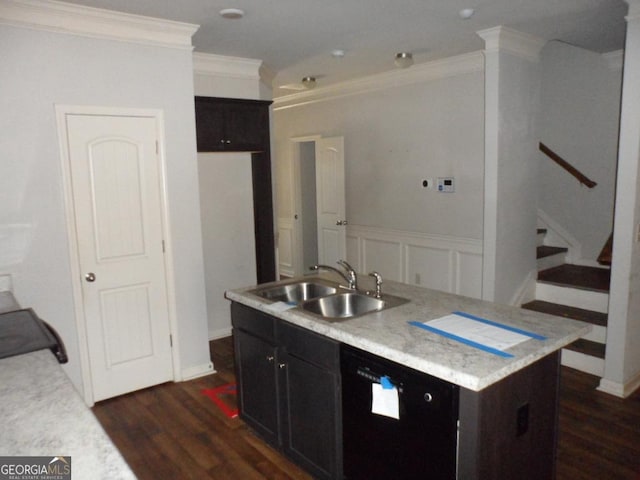 kitchen with crown molding, dark wood-type flooring, black dishwasher, a sink, and light countertops