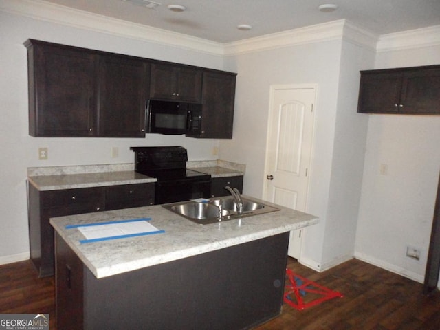 kitchen with dark wood-type flooring, crown molding, a sink, and black appliances