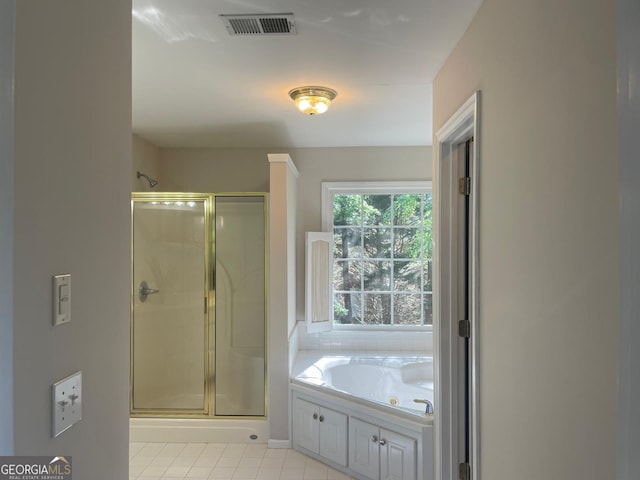 8100 Greens Mill Way, Loganville, GA 30052 - bathroom with a shower stall, tile patterned floors, and a whirlpool tub