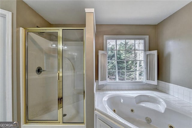 8100 Greens Mill Way, Loganville, GA 30052 - bathroom with a shower stall and a tub with jets
