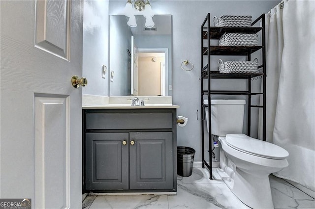 8100 Greens Mill Way, Loganville, GA 30052 - full bath featuring marble look tiles, toilet, and vanity