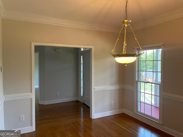 8100 Greens Mill Way, Loganville, GA 30052 - unfurnished dining area with wood finished floors, ornamental molding, and baseboards