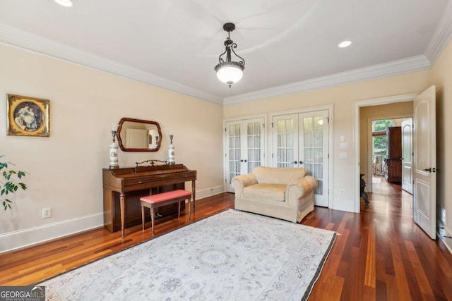 6935 Wakehurst Pl, Cumming, GA 30040 - sitting room with french doors, dark wood-type flooring, ornamental molding, baseboards, and recessed lighting