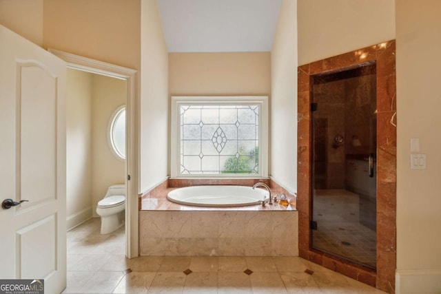 6935 Wakehurst Pl, Cumming, GA 30040 - bathroom with a garden tub, a stall shower, toilet, and tile patterned flooring