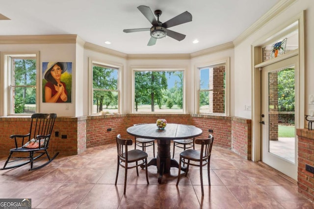 6935 Wakehurst Pl, Cumming, GA 30040 - tiled dining area featuring brick wall, ornamental molding, and ceiling fan