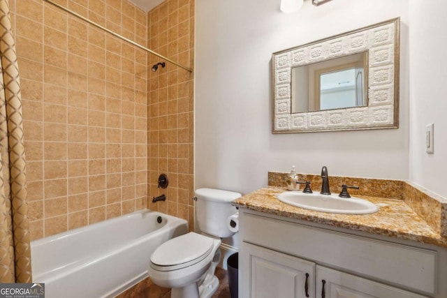 6935 Wakehurst Pl, Cumming, GA 30040 - bathroom featuring shower / tub combo with curtain, vanity, and toilet