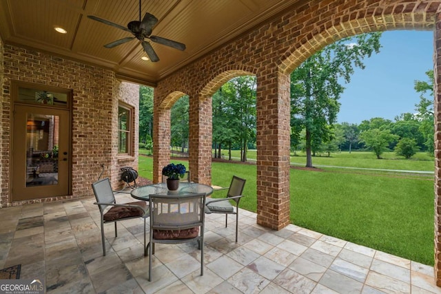 6935 Wakehurst Pl, Cumming, GA 30040 - view of patio / terrace with ceiling fan and outdoor dining area