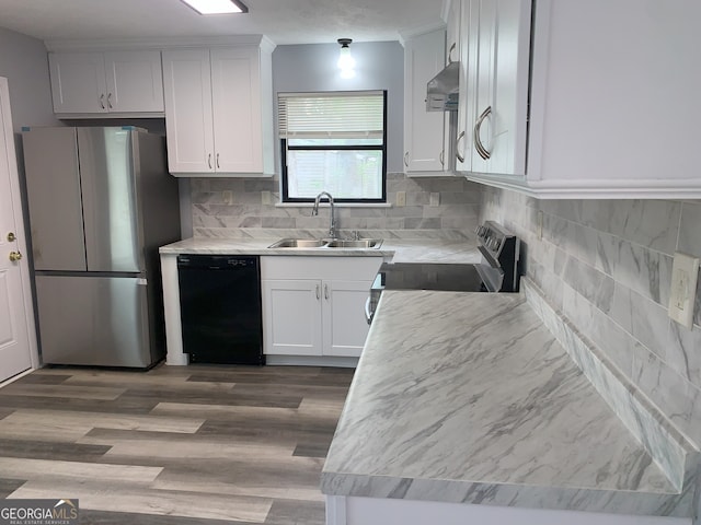 3261 Harbor Woods Rd, Decatur, GA 30034 - kitchen with stainless steel appliances, white cabinetry, a sink, and decorative backsplash
