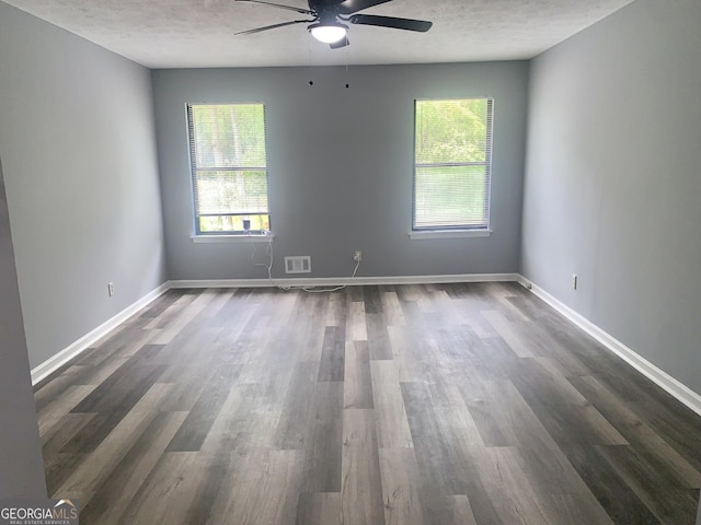 3261 Harbor Woods Rd, Decatur, GA 30034 - empty room with a textured ceiling, ceiling fan, and plenty of natural light