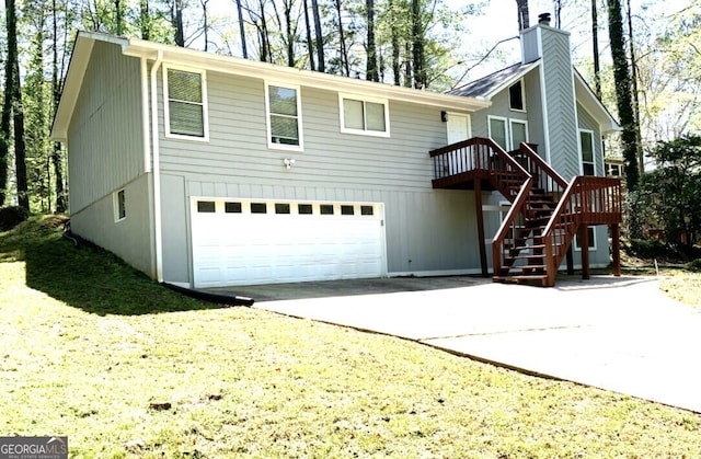 3261 Harbor Woods Rd, Decatur, GA 30034 - rear view of house featuring an attached garage, driveway, and stairs
