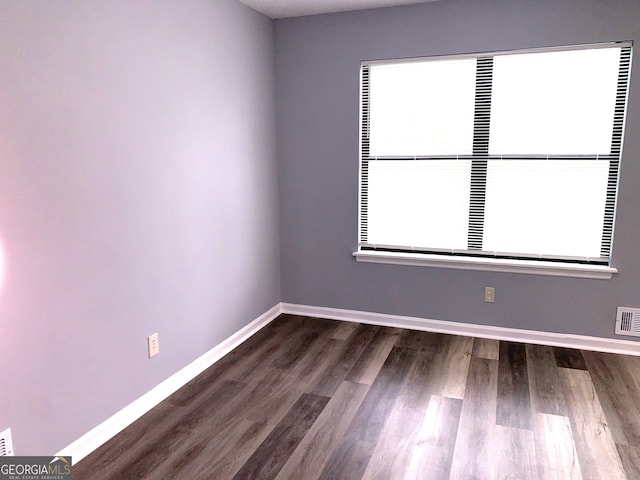 3261 Harbor Woods Rd, Decatur, GA 30034 - unfurnished room with visible vents, baseboards, and wood finished floors