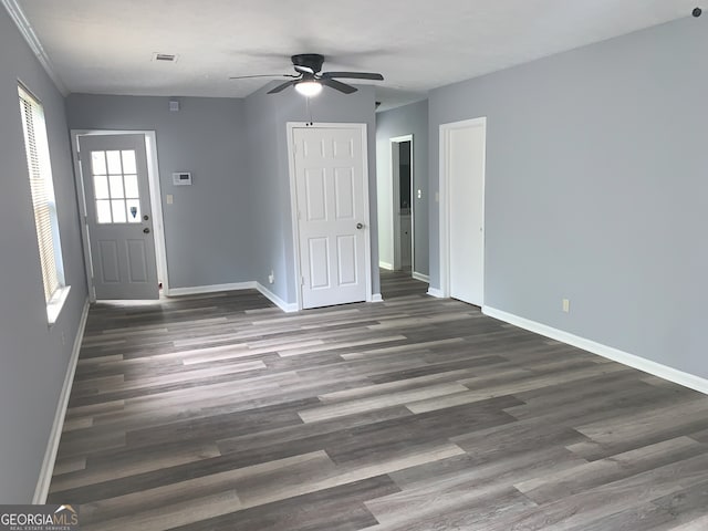 3261 Harbor Woods Rd, Decatur, GA 30034 - unfurnished living room with wood finished floors, ceiling fan, baseboards, and visible vents
