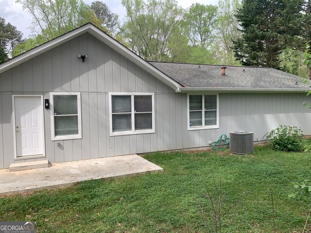 3261 Harbor Woods Rd, Decatur, GA 30034 - rear view of property featuring a lawn, a patio area, central air condition unit, and a shingled roof
