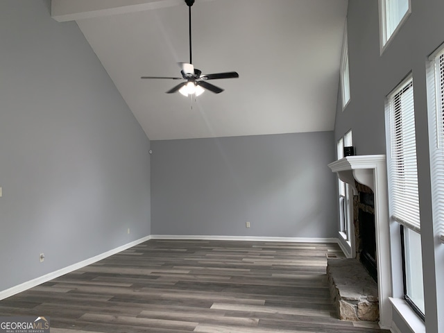 3261 Harbor Woods Rd, Decatur, GA 30034 - unfurnished living room with baseboards, a ceiling fan, high vaulted ceiling, and a fireplace