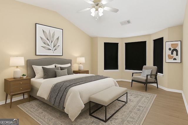 7112 Brookview Way, Riverdale, GA 30274 - bedroom with visible vents, light wood-style flooring, vaulted ceiling, and baseboards