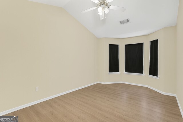 7112 Brookview Way, Riverdale, GA 30274 - unfurnished room featuring light wood finished floors, visible vents, baseboards, and a ceiling fan