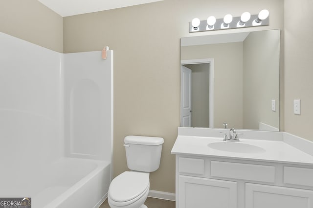 7112 Brookview Way, Riverdale, GA 30274 - bathroom with toilet, bathtub / shower combination, vanity, and baseboards