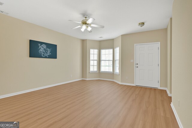 7112 Brookview Way, Riverdale, GA 30274 - interior space with light wood-style floors, baseboards, a ceiling fan, and visible vents