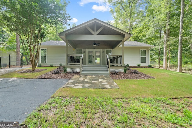 348 Bluegill Rd, Eatonton, GA 31024 - view of front of home featuring a ceiling fan and roof with shingles