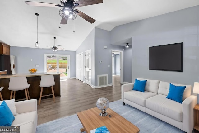 348 Bluegill Rd, Eatonton, GA 31024 - living area with ceiling fan, vaulted ceiling, and wood finished floors