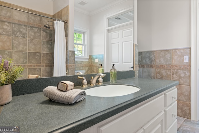 2091 Juliention Dr NE, Townsend, GA 31331 - bathroom with ornamental molding, tile walls, vanity, and visible vents