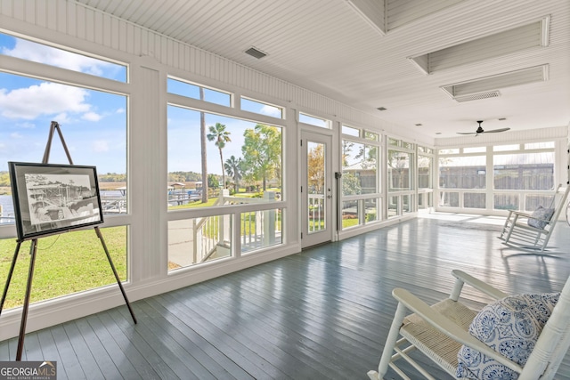 2091 Juliention Dr NE, Townsend, GA 31331 - sunroom featuring wood-type flooring, a deck, and visible vents