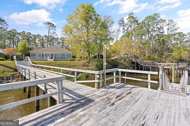 2091 Juliention Dr NE, Townsend, GA 31331 - wooden deck with a water view