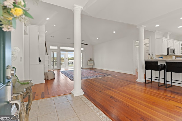 2091 Juliention Dr NE, Townsend, GA 31331 - foyer featuring light tile patterned floors, baseboards, decorative columns, and recessed lighting