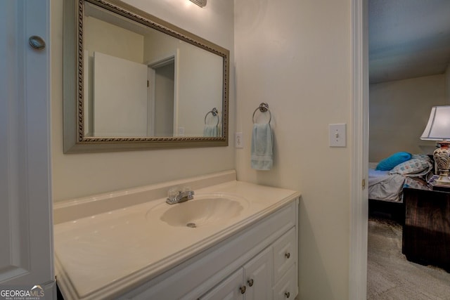 bathroom with vanity and connected bathroom