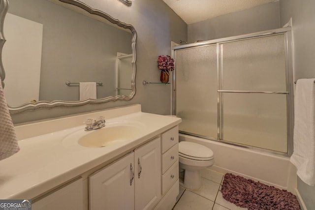 full bath with combined bath / shower with glass door, toilet, a textured ceiling, vanity, and tile patterned floors