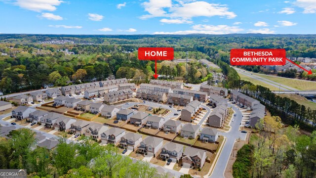 aerial view with a view of trees and a residential view