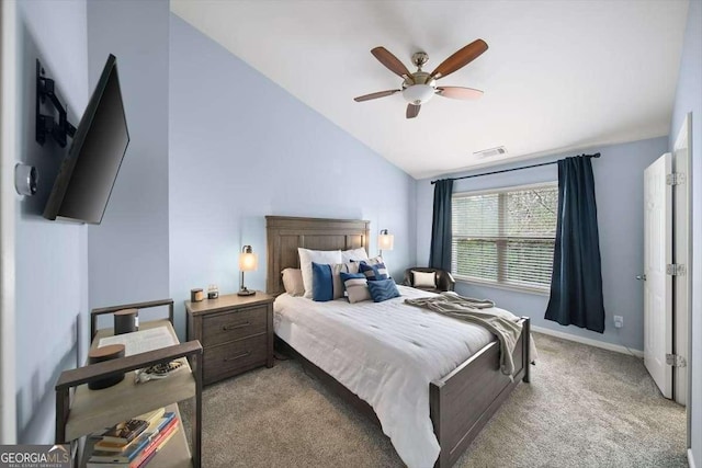 carpeted bedroom featuring ceiling fan, baseboards, lofted ceiling, and visible vents