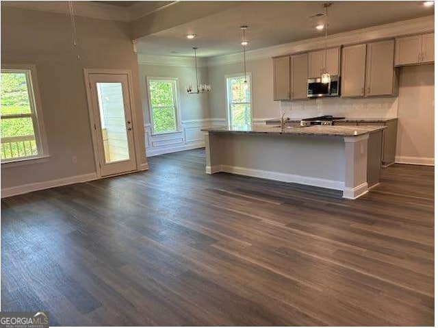 3383 Milan Court Lot 4; Plapprox Sqft 1, Douglasville, GA 30135 - kitchen with stainless steel microwave, gray cabinets, dark wood-style flooring, healthy amount of natural light, and ornamental molding