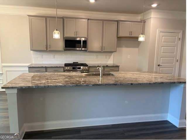3383 Milan Court Lot 4; Plapprox Sqft 1, Douglasville, GA 30135 - kitchen featuring appliances with stainless steel finishes, gray cabinetry, a sink, crown molding, and tasteful backsplash
