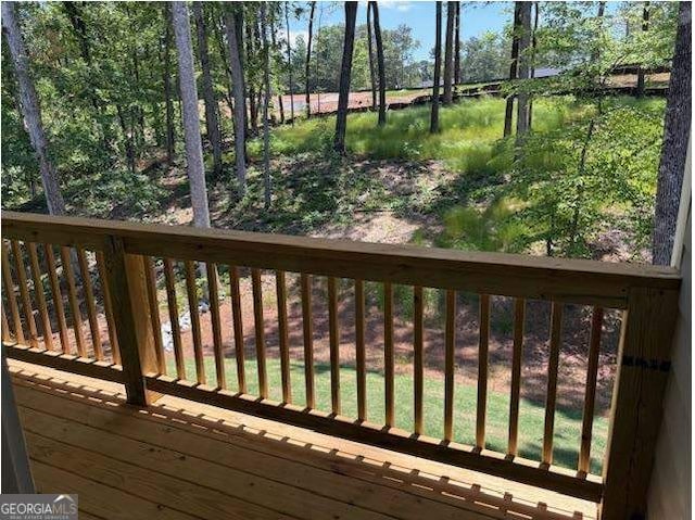 3383 Milan Court Lot 4; Plapprox Sqft 1, Douglasville, GA 30135 - wooden terrace featuring view of wooded area