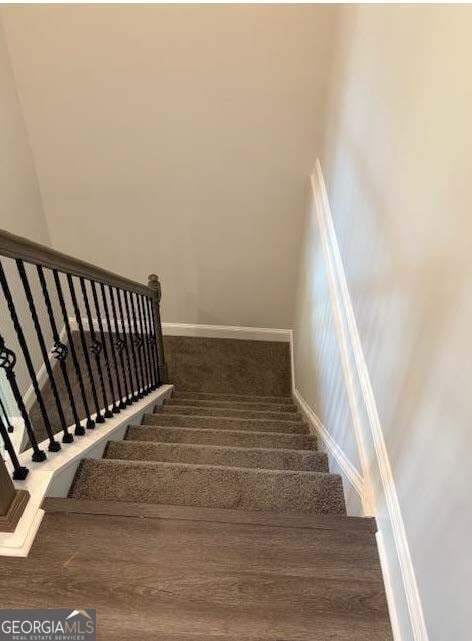 3383 Milan Court Lot 4; Plapprox Sqft 1, Douglasville, GA 30135 - stairway featuring baseboards