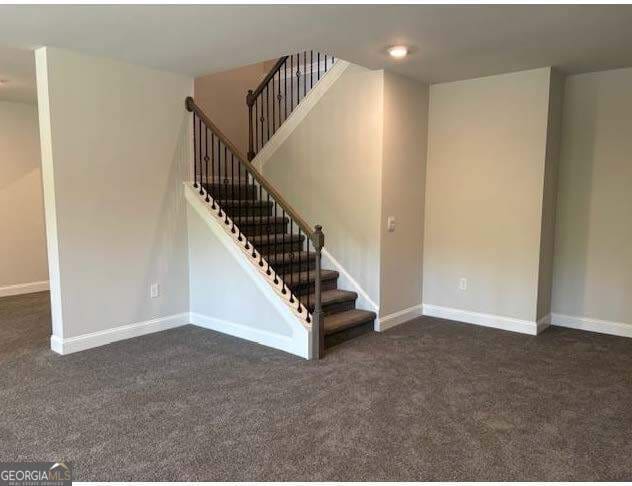 3383 Milan Court Lot 4; Plapprox Sqft 1, Douglasville, GA 30135 - staircase featuring carpet flooring and baseboards