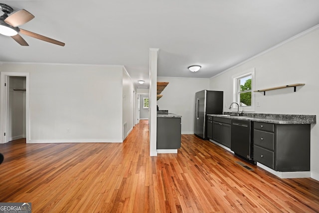 262 E Main St, Rutledge, GA 30663 - kitchen with freestanding refrigerator, black dishwasher, open shelves, crown molding, and light wood-type flooring