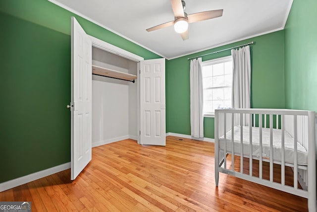 262 E Main St, Rutledge, GA 30663 - bedroom with crown molding, light wood-type flooring, and baseboards